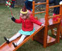 Wendy on wooden slide March 1976